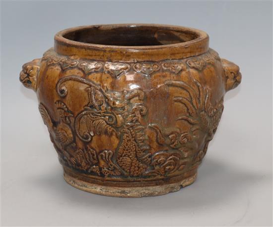 A Chinese brown glazed dragon, cockerel and deer jar, 19th century height 17cm